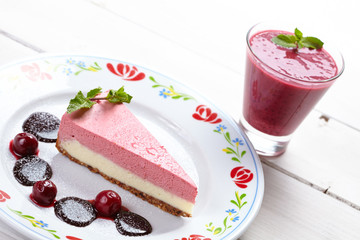 tasty cheesecake with smoothie