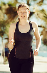 Fototapeta premium Girl during racewalking training