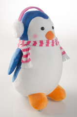 toy or funny handmade toy penguins on background.