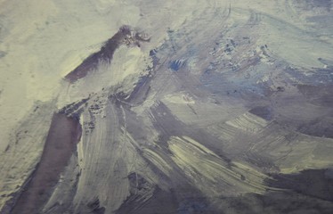 Painting of the wooden surface, a palette of the paints, an abstraction
