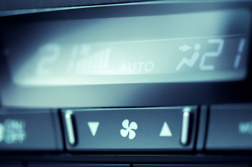 Close-up of air condition button in modern car