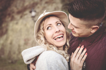 Happy couple outdoor. Young couple  enjoying in spring day.