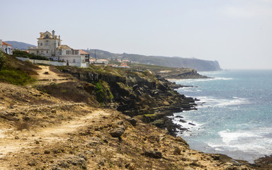 A view from the unstable cliffs near the ocean in Colares region (Sintra, Portugal)