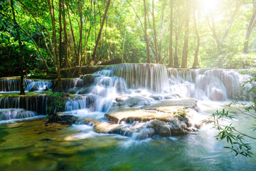 water fall with sun shine kanchanaburi thailand