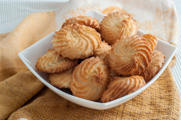 homemade shortbread biscuit on the plate with tablecloth