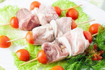 Raw pork beef meat on the white plate