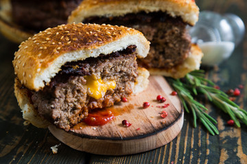 Big burger with cheddar cheese © Ruslan Mitin