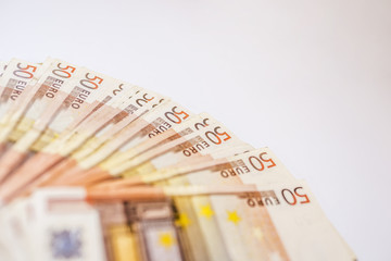 50 euro banknotes in a row. European Union Currency. Stack of 50 euro banknotes.
