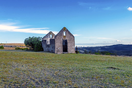 Rural Old  Derelect Farm Building on Dry Winter Landscape