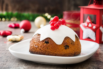 Christmas pudding on wooden table
