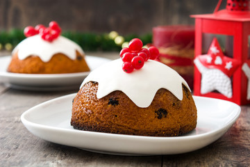 Fototapeta na wymiar Christmas pudding on wooden table 