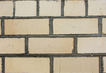 Texture of an old ruined brick wall. A rough wall. Background.