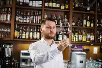 Sommelier tasting the wine
