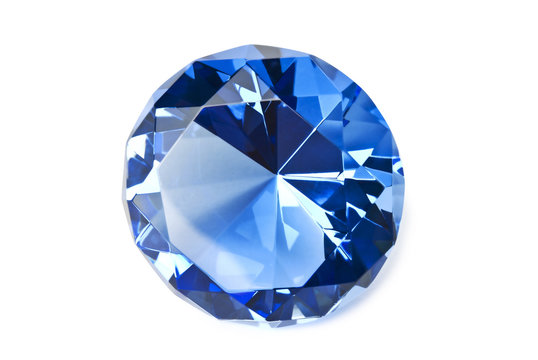 Blue gemstone isolated on white background with shadow. Clipping path included.