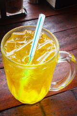 Iced chrysanthemum tea served with syrup.