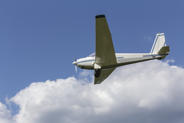 Fototapeta na wymiar small motorplane in the air