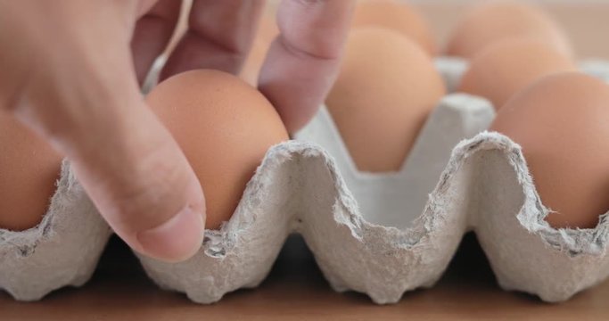 Hand pick eggs from package