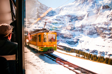 Yellow train of wengernalpbahn at Kleine Scheidegg station, Jungfrau - 168999608