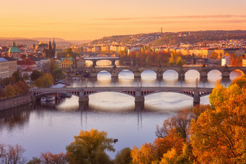 Autumn in Prague, view to the historical bridges, old town and Vltava river from popular view point...