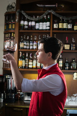 Sommelier tasting the red wine
