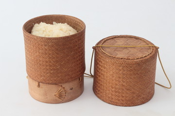 bamboo container for holding cooked glutinous rice.