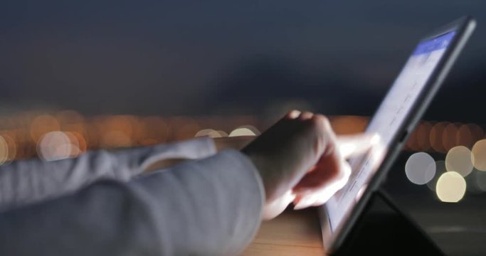 Finger touching on the screen of tablet computer