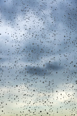 Rain / Water drop of rain on glass with outdoor background