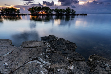 Calm Ocean at Sunset from the Rocky Shore