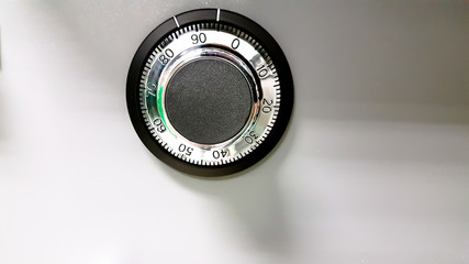 combination lock on the safe closeup gray