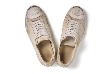 Old white shoes isolate