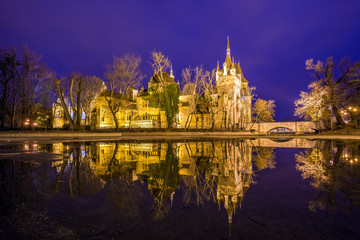 Budapest, Hungary - The beautiful Vajdahunyad Castle with reflection in the City Park of Budapest at blue hour