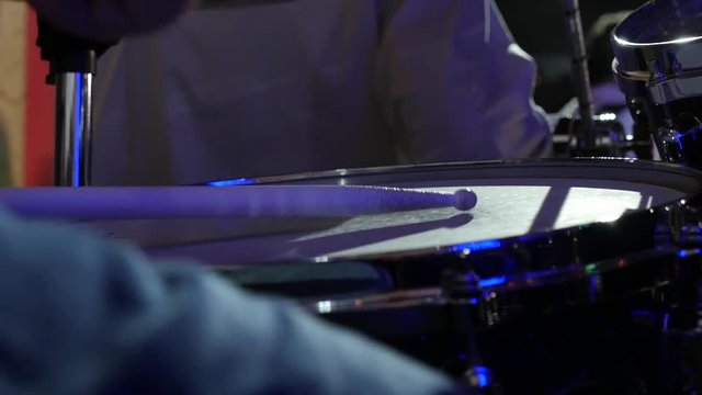 musician playing drum plate on jazz festival. Slow motion close-up