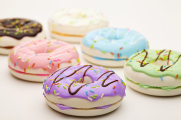 Colorful doughnut on white background table