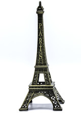 Fototapeta na wymiar Souvenir Model of the Eiffel Tower on White Background