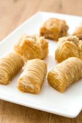 Turkish dessert baklava on wooden table
