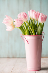 Pink and White Pastel Tulips in Pink Bucket Vase