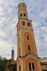 Bell Tower of the Nativity of Christ Albanian Orthodox church in the center of Shkoder, Albania, In the background the clock tower of the Franciscan Church. South-East Europe.