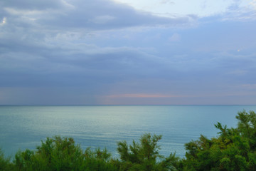 The setting sun over the sea