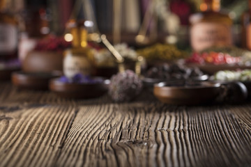 Fototapeta na wymiar Wooden table, shallow depth of focus. Chinese medicine concept. Macro shot. 