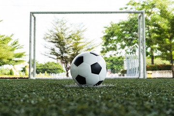 football field  ball on green grass , soccer field  background texture