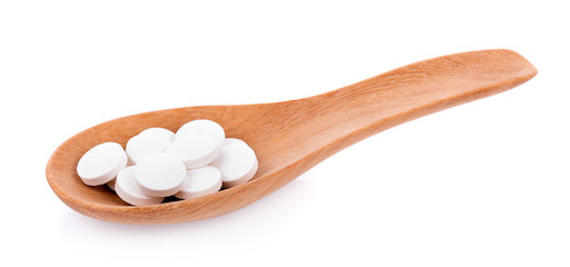 white pills isolated on white background