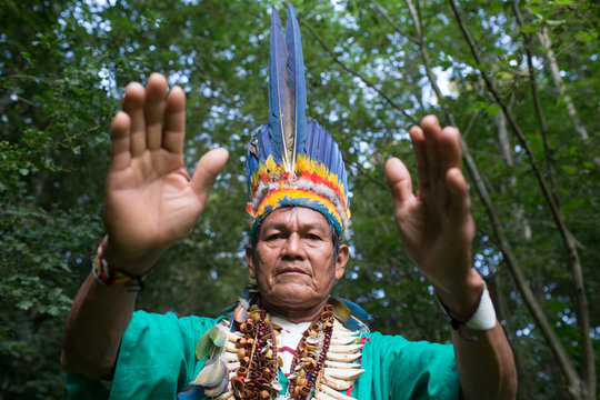 Man in authentic costume posing in woods