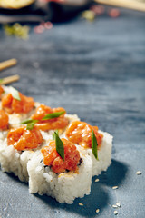 Menu of Japanese sushi rolls on black background