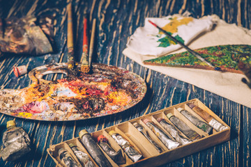 Art paints, palette, brushes pencil