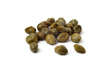 capers on a white background