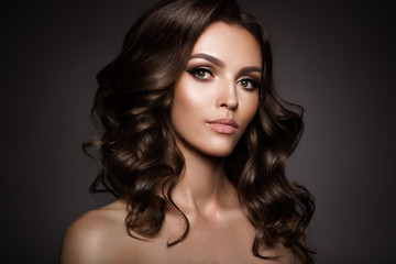 Fototapeta premium Beautiful young brunette with bright make up