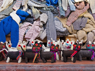 Traditional Mayan clothes and cat toys at street market, Playa del Carmen, Mexico