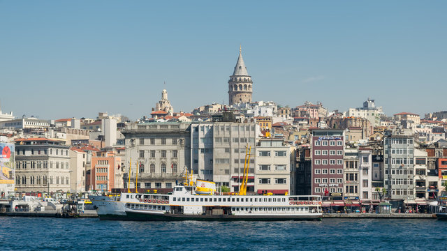 City view of Istanbul, Turkey from the sea overlooking Galata Tower and Karakoy ferry terminal