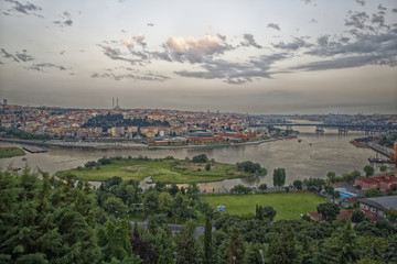 Istanbul  (Turkey) panoramic daylight view from Pier Loti hill with clouds in sky in background