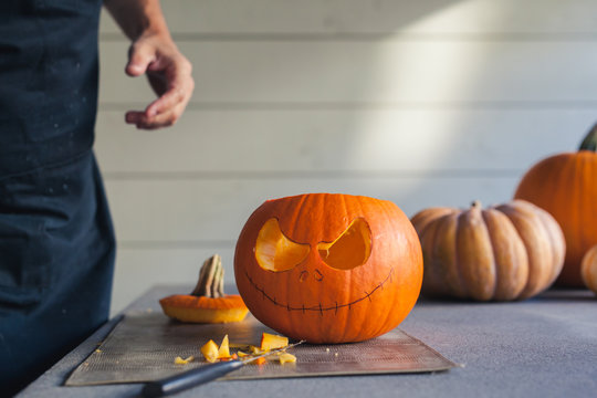 Carving a pumpkin for halloween